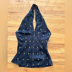 Pretty and sophisticated halter top by Ralph Lauren. Size 4. Black w/golden dots